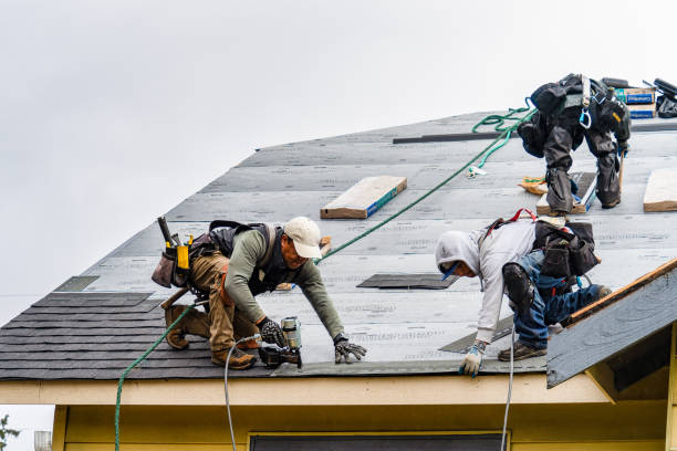 Professional Gutter Installation technician working in Smartsville, CA